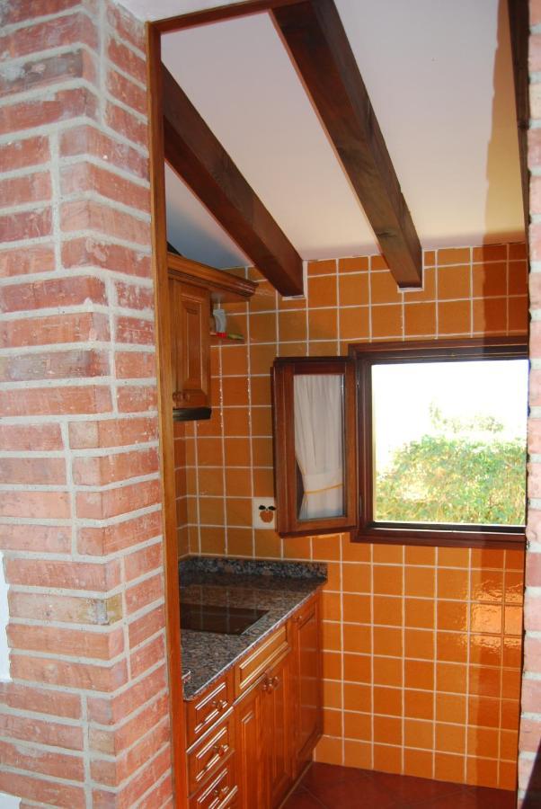 Apartamentos El Perujo โกมิญาส ภายนอก รูปภาพ